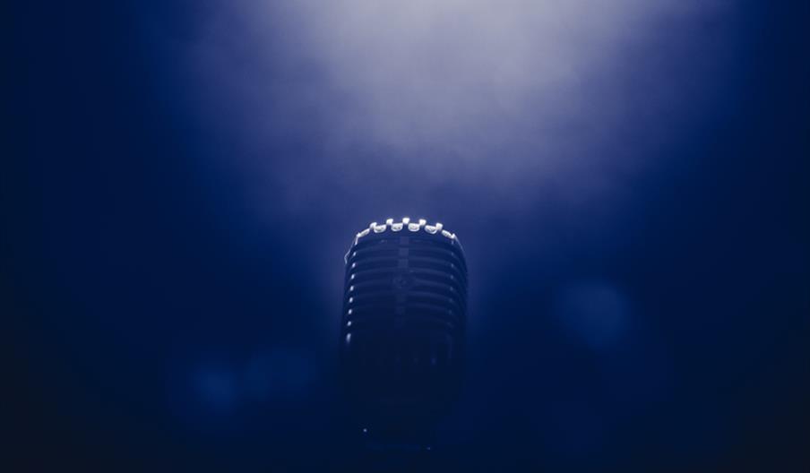 Microphone in blue smoke