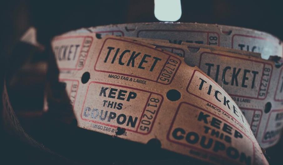 Close up of a roll of tickets for a show