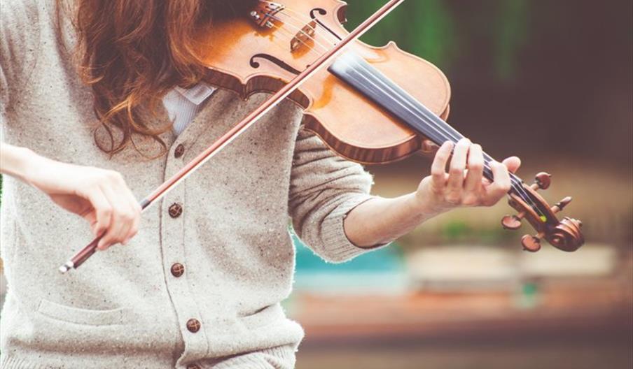 Person playing a violin