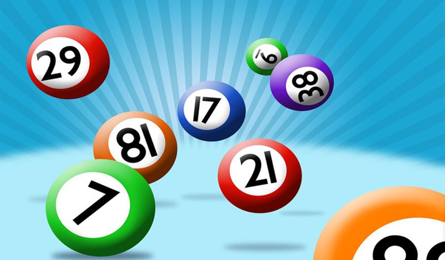 Colourful bingo balls across a bright blue background